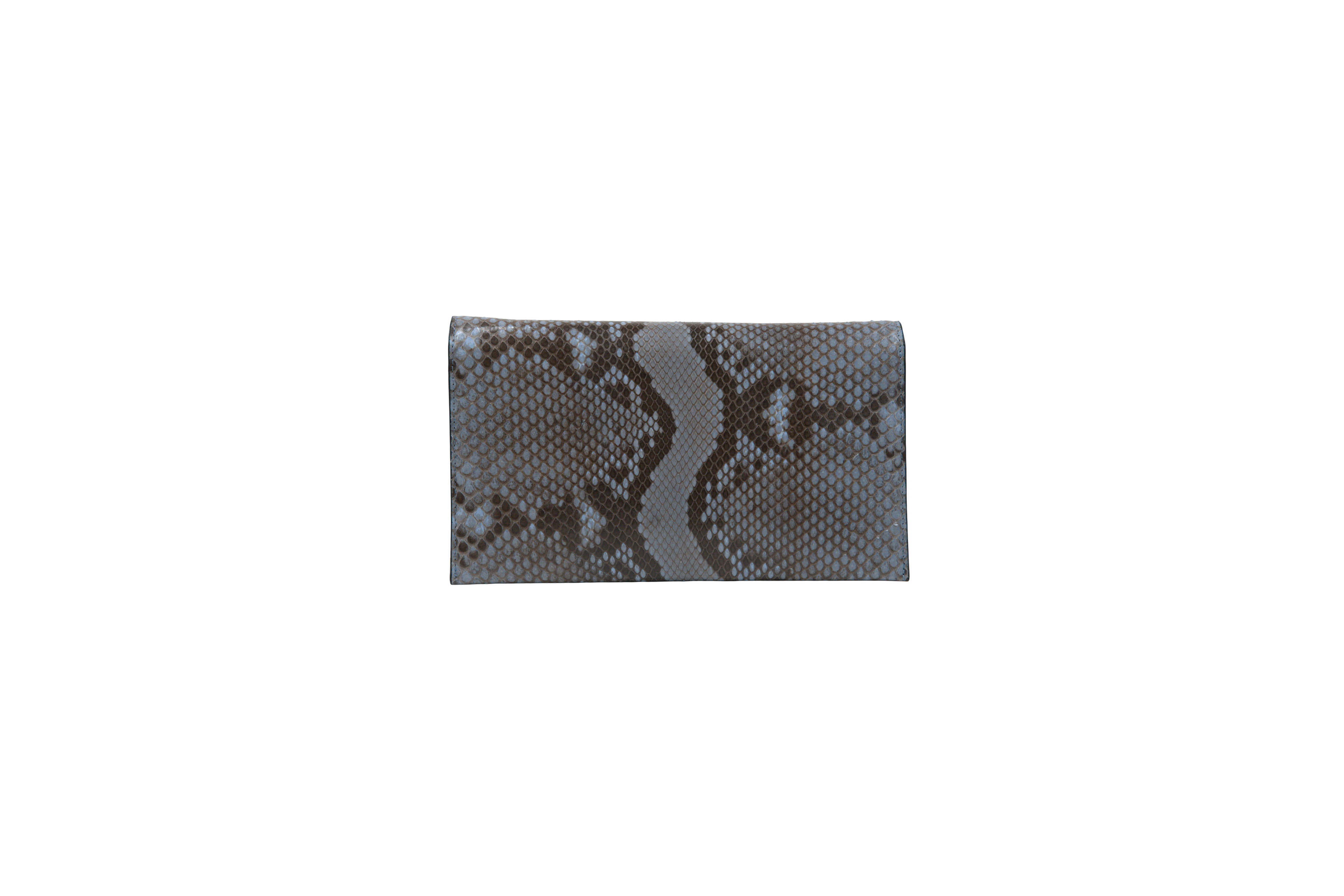 Snake skin patterned clutch bag on a white background