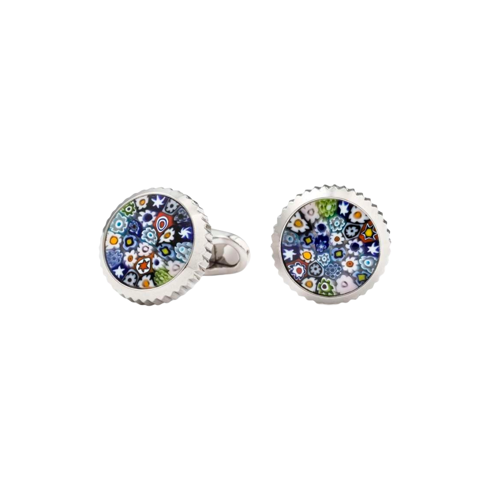 Pair of round cufflinks with floral design on a black background