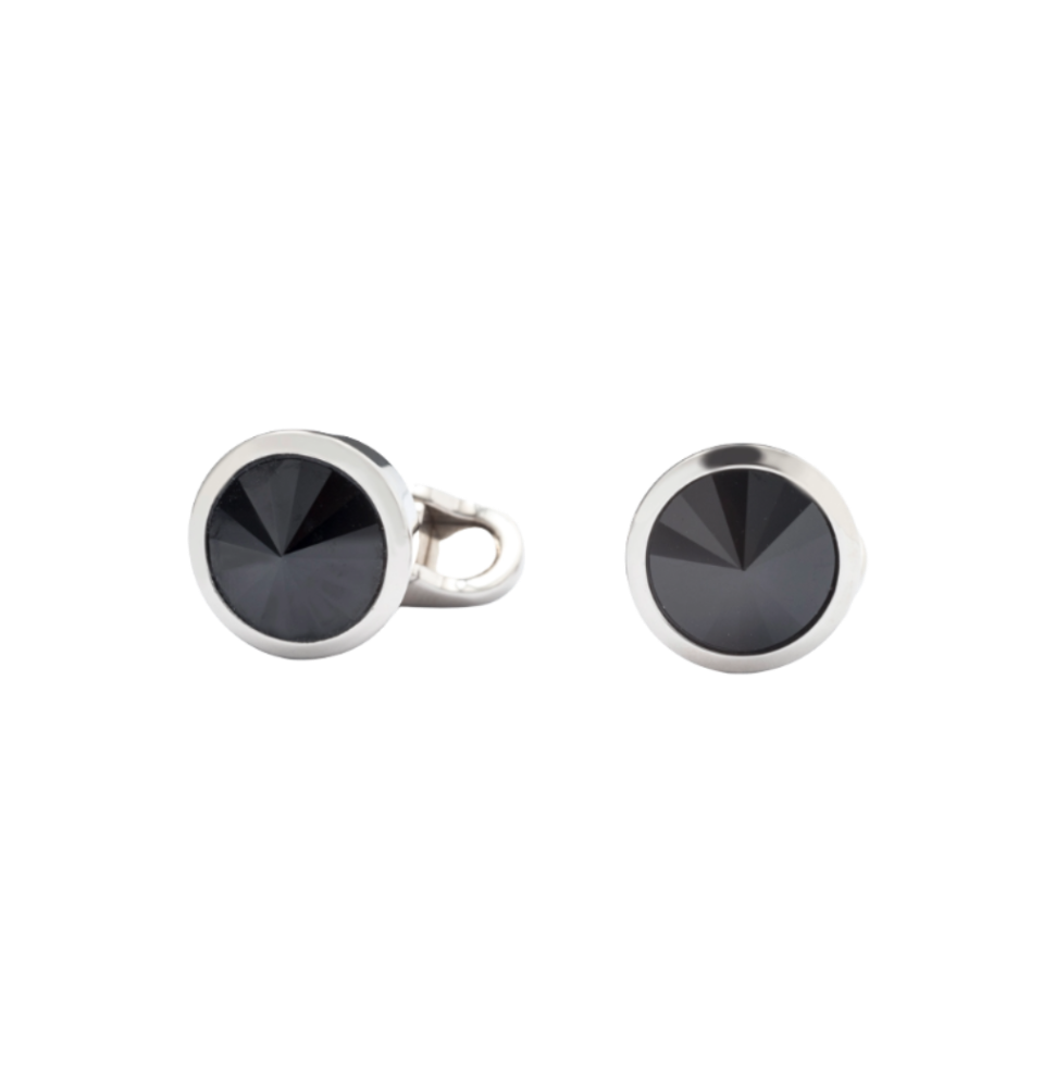 Pair of black cufflinks on a white background