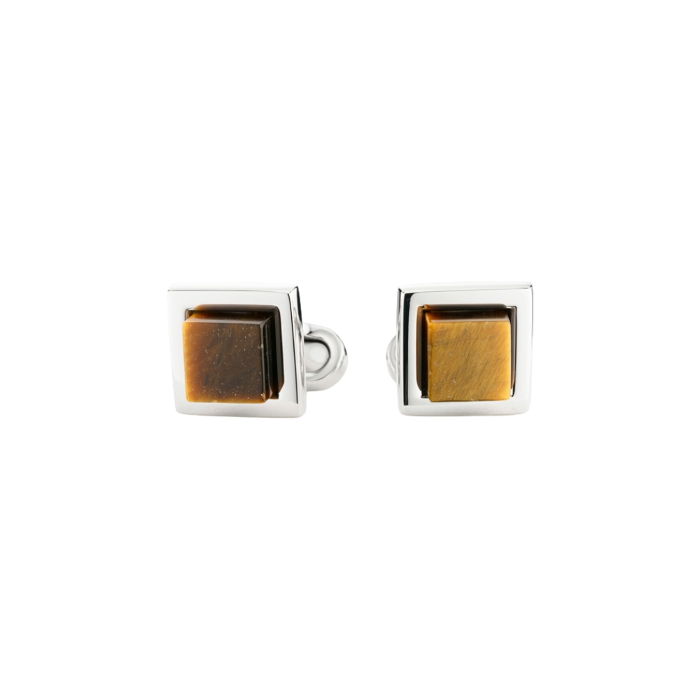 Pair of square cufflinks with gold and silver finish on a white background