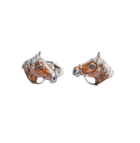 Horse head cufflinks on a white background