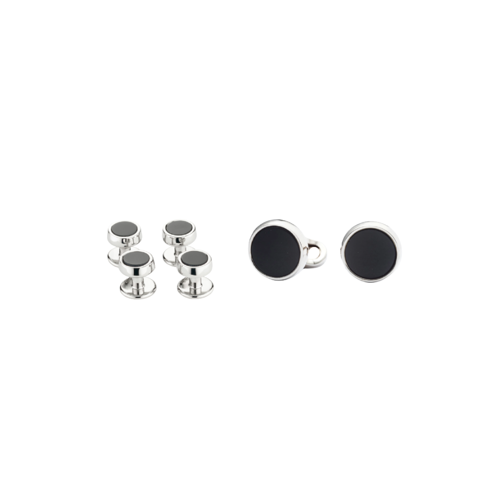 Cufflinks with black centers and silver borders on a white background