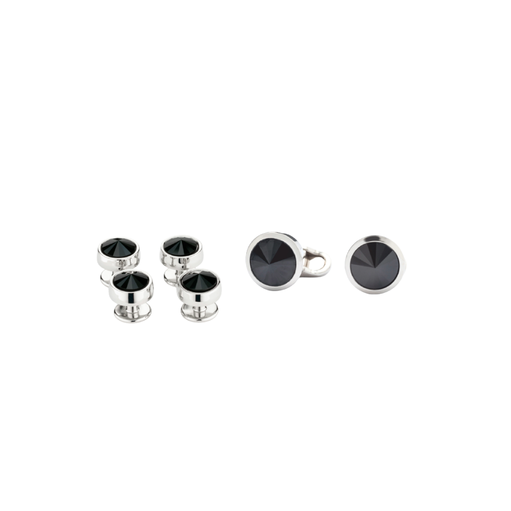 Set of silver cufflinks with black gemstones on a white background